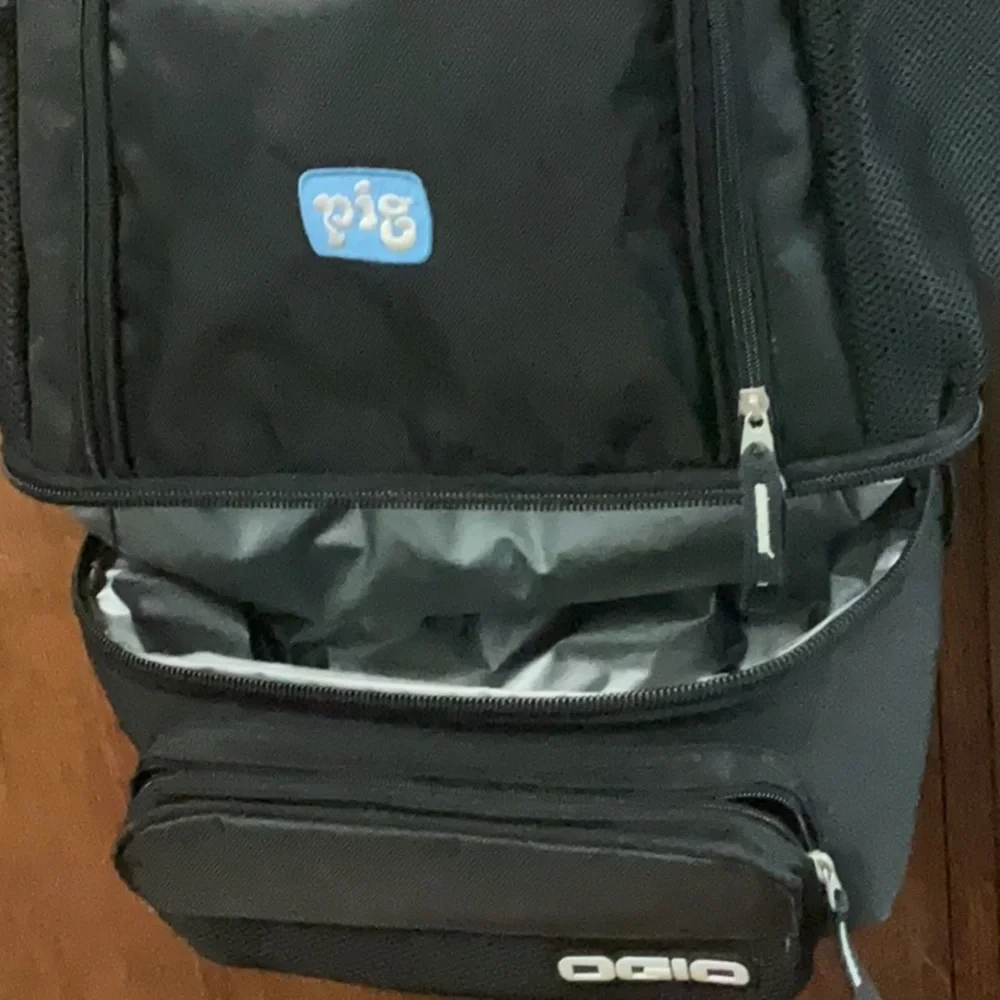 OGIO® Cooler Backpack is a versatile and stylish option for travel or casual use